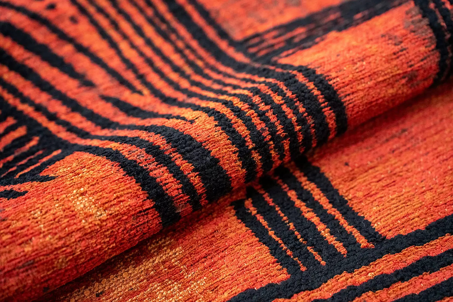 Orange oval rug KANJI with black