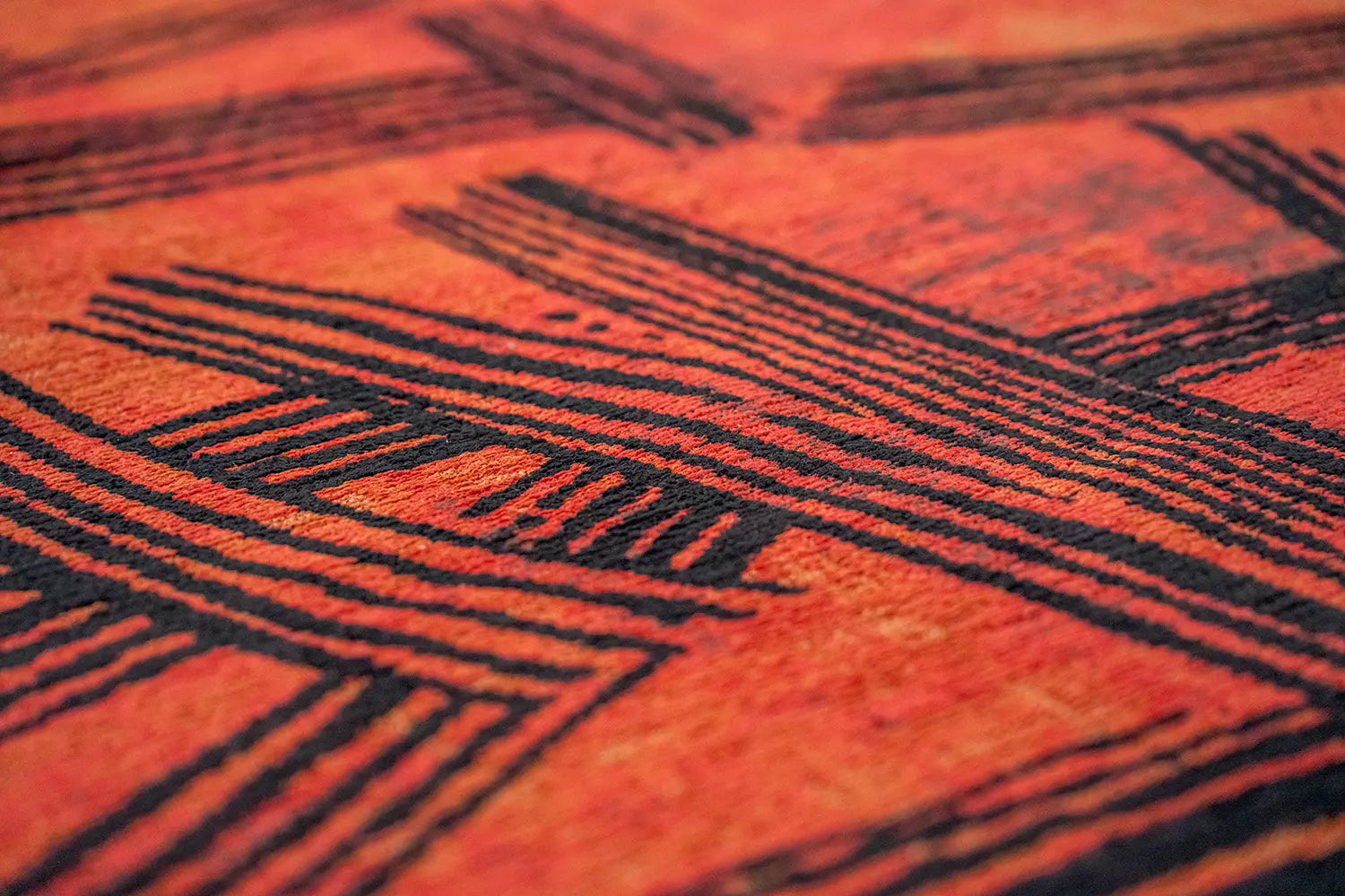 Orange oval rug KANJI with black