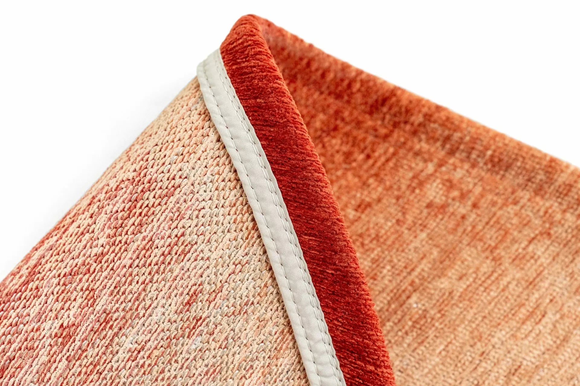 Ovaler Teppich AQUARELLE LEAF rot mit orangefarbenen Akzenten