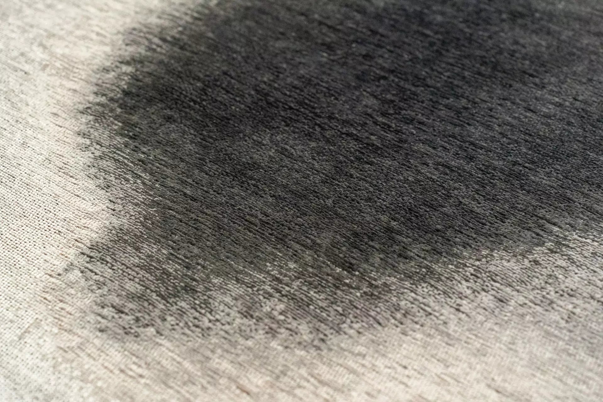 Ovaler Teppich AQUARELLE LEAF schwarz mit beige