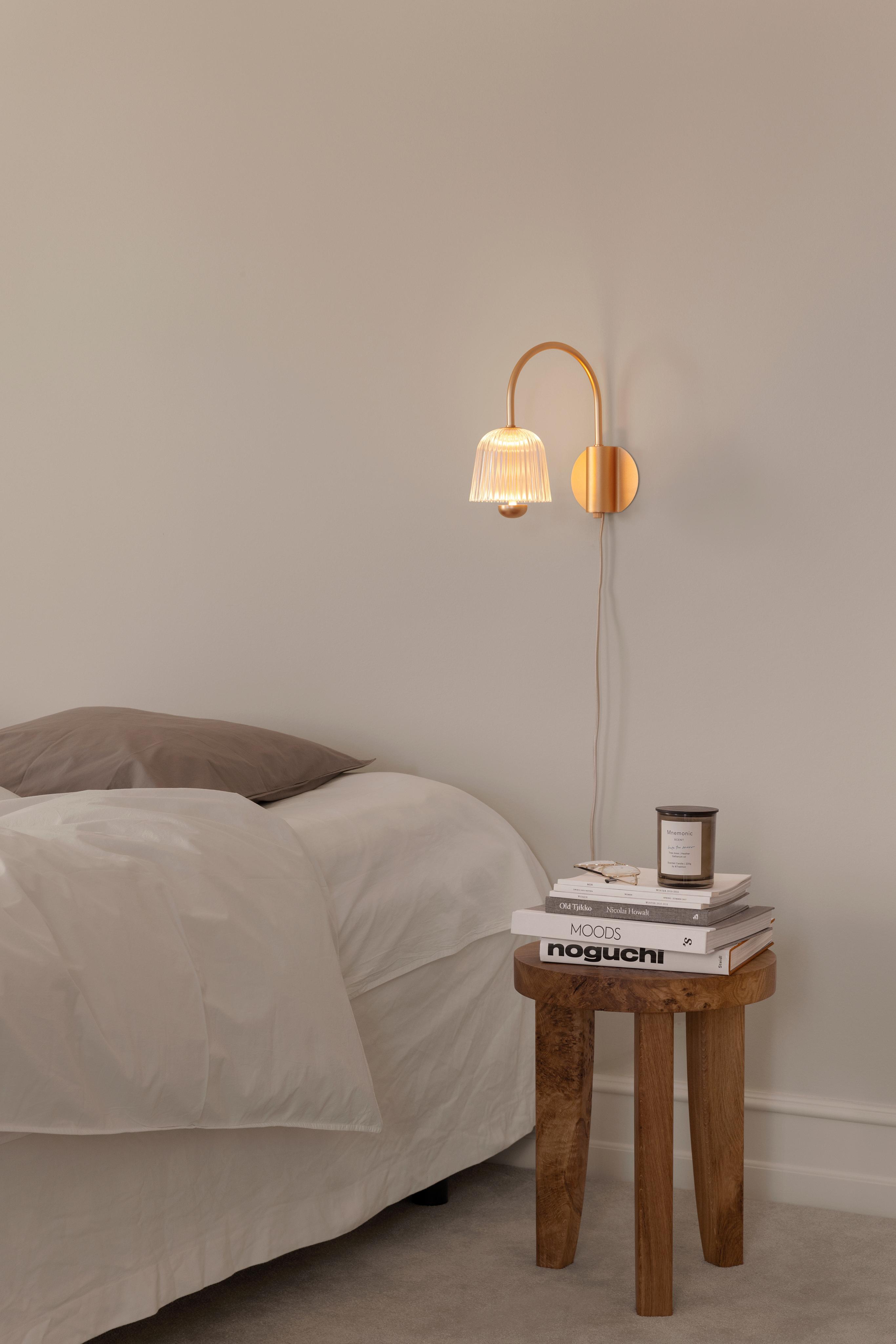 Wandleuchte ASTEEA gold mit transparentem Design