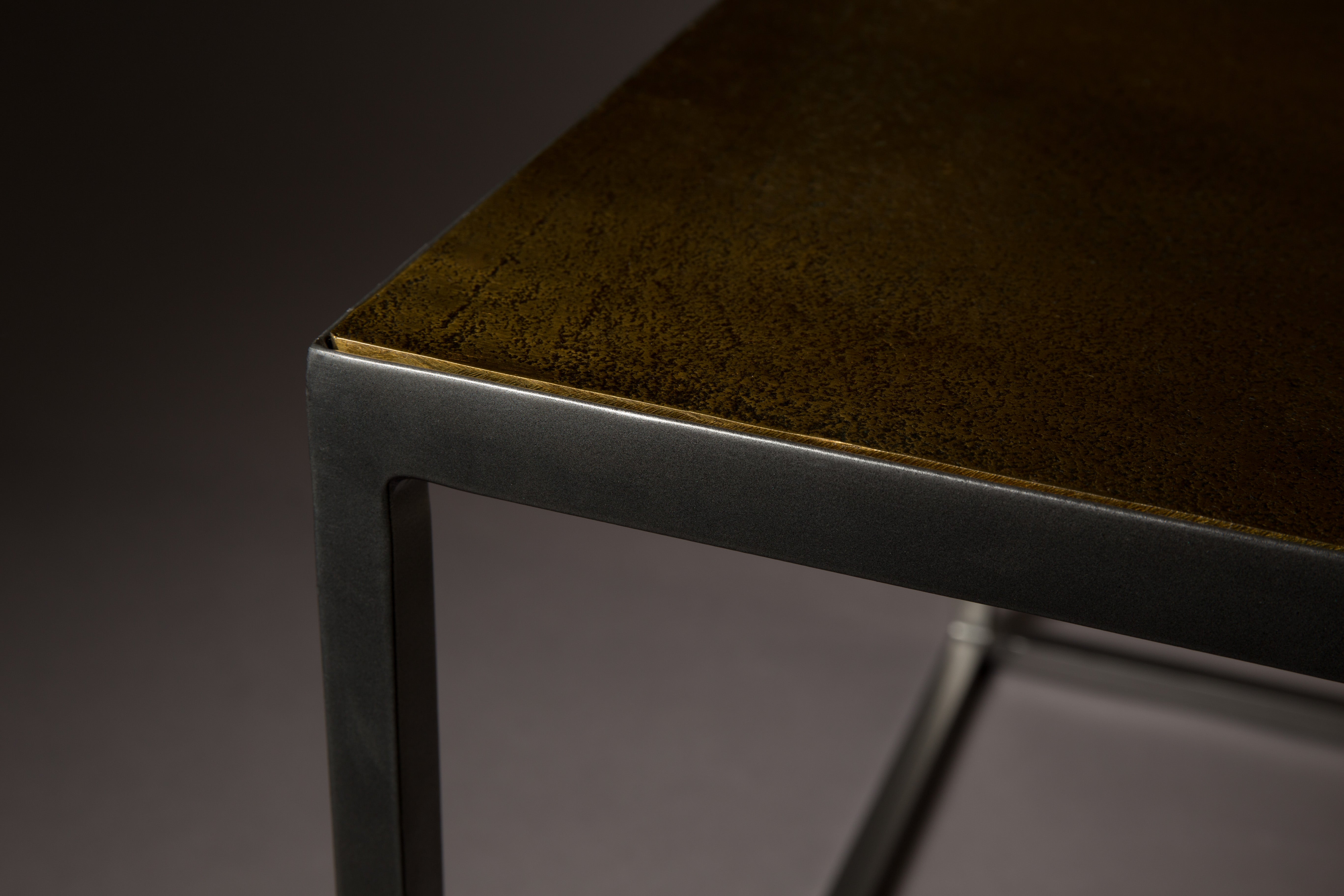 LEE dark brown coffee table with a black base