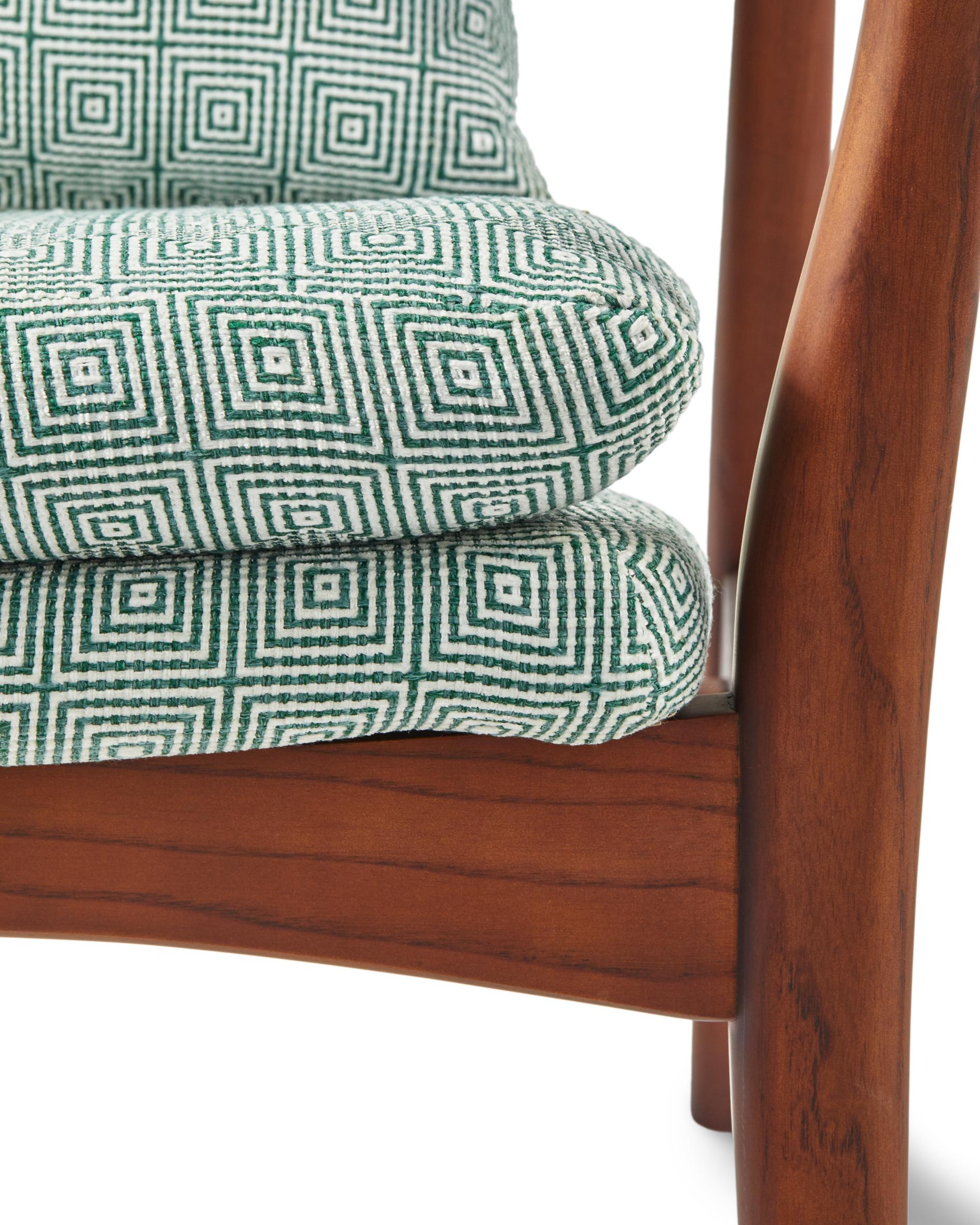 PEGGY armchair in green with geometric patterns and a wooden base