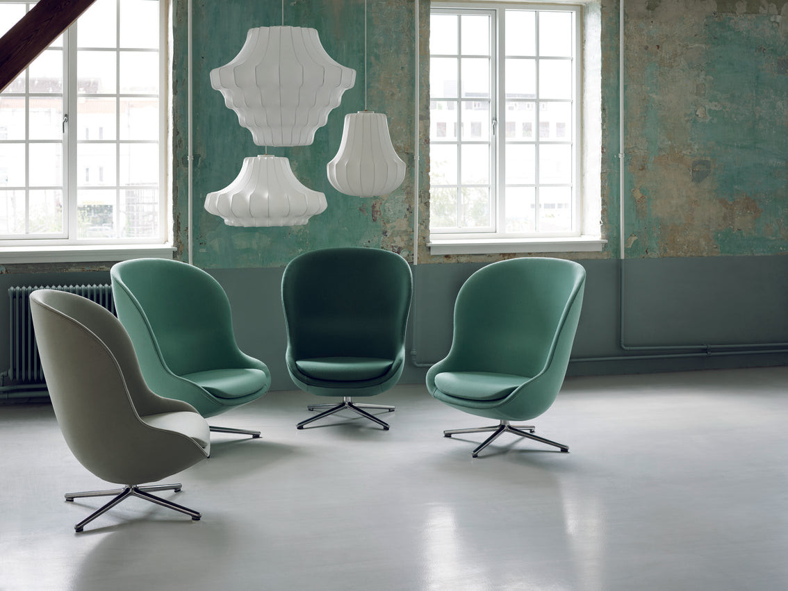 HYG HIGH armchair with an aluminum adjustable base