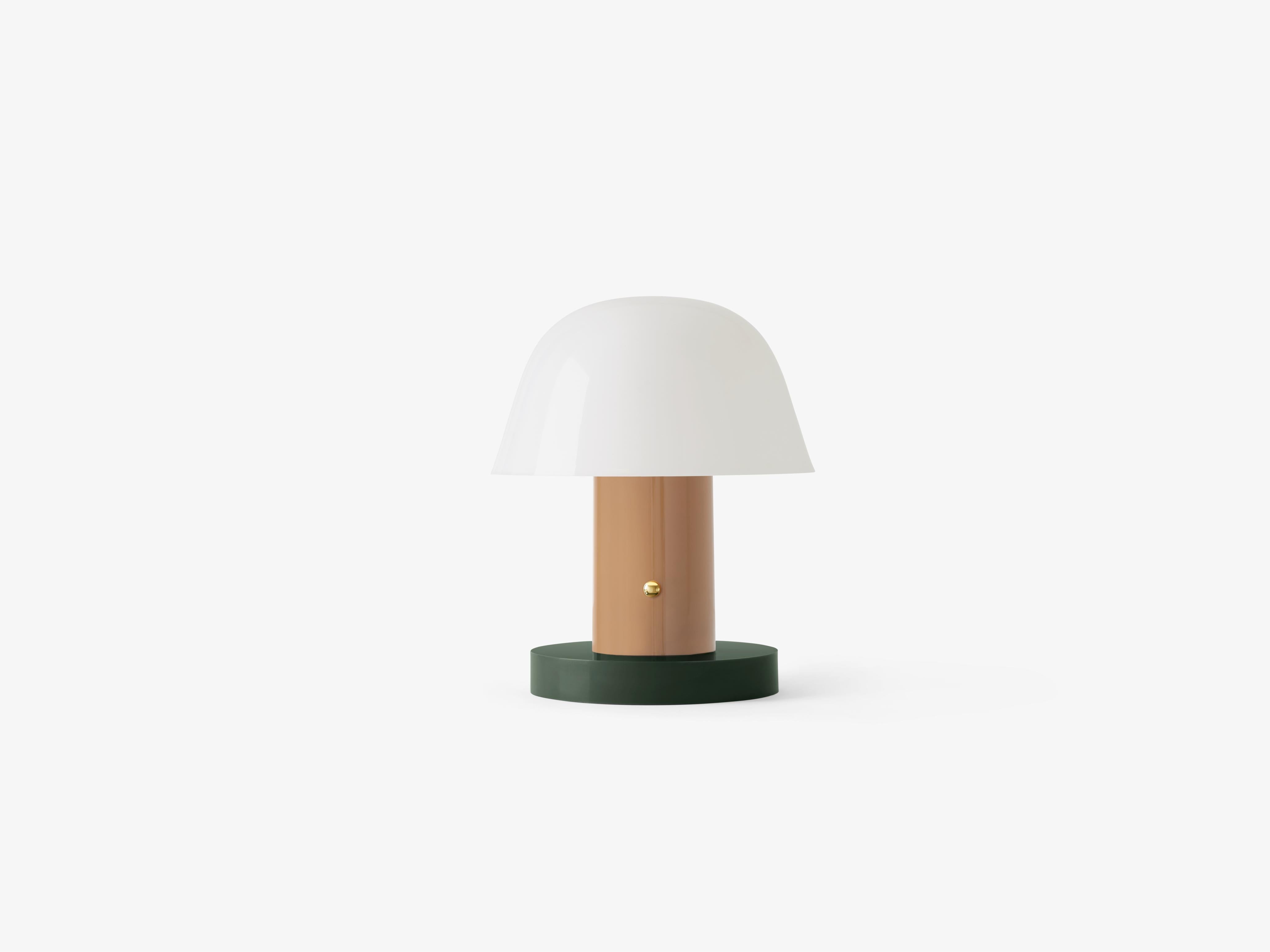 Tragbare Lampe SETAGO JH27 mit cremefarbenem Schirm und beige-grünem Fuß.