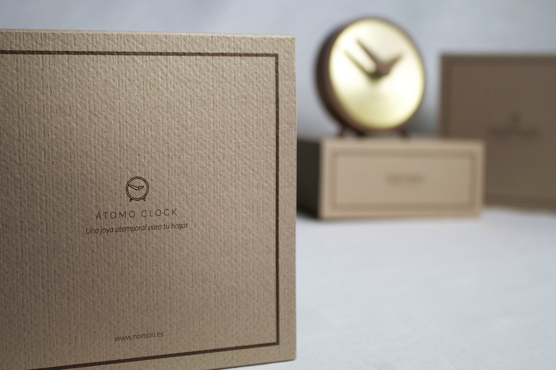 ATOMO walnut wood table clock with brass finish