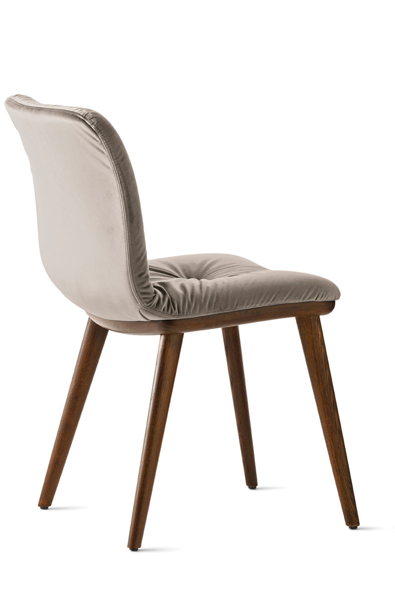 ANNIE SOFT upholstered chair with a dark wooden base