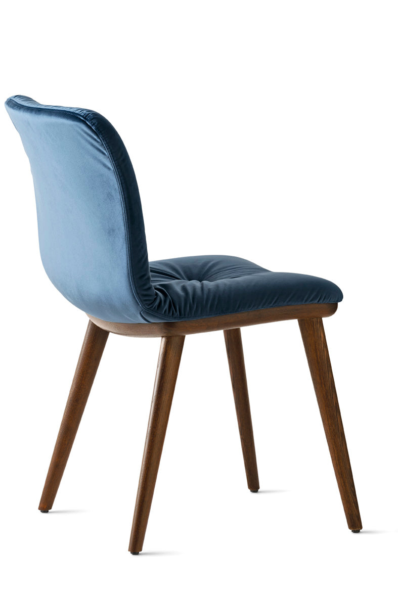 ANNIE SOFT upholstered chair with a dark wooden base