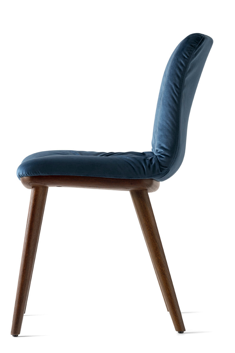 ANNIE SOFT upholstered chair with a dark wooden base