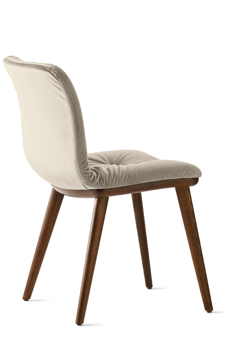 ANNIE SOFT upholstered chair with a dark wooden base