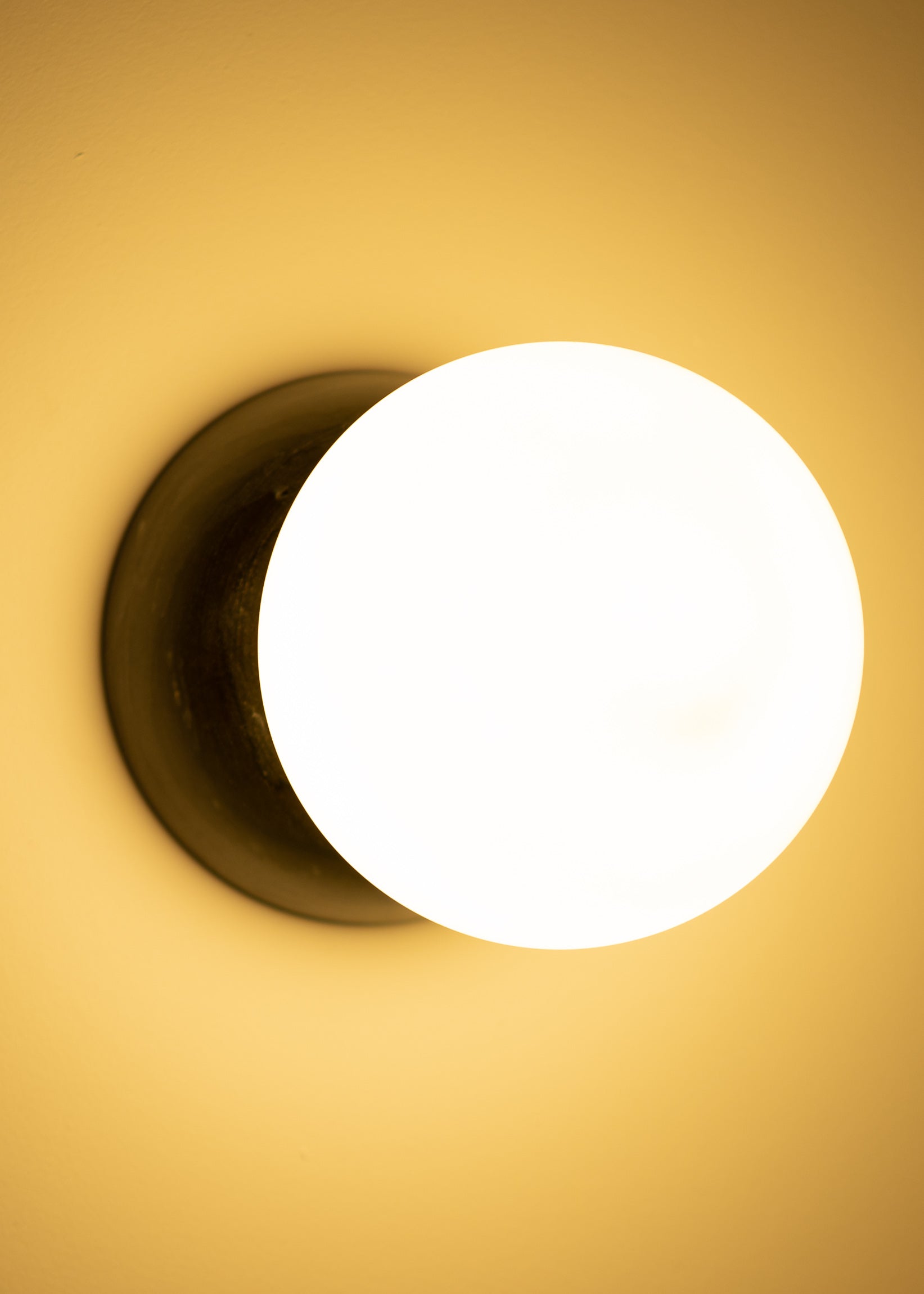 Wandleuchte EKLIPSO schwarzer Marmor