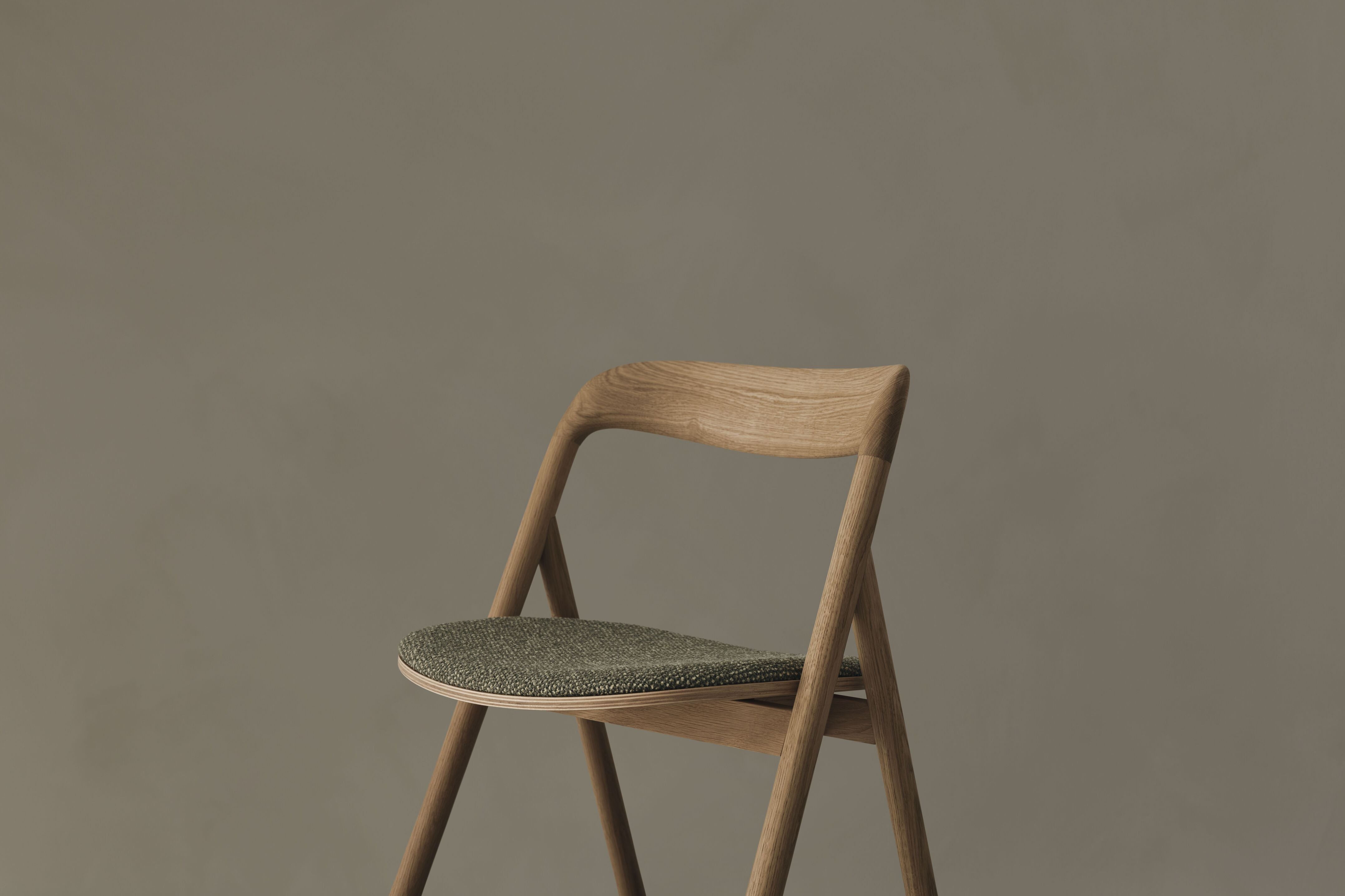 Fenri chair upholstered with a whitened wooden base