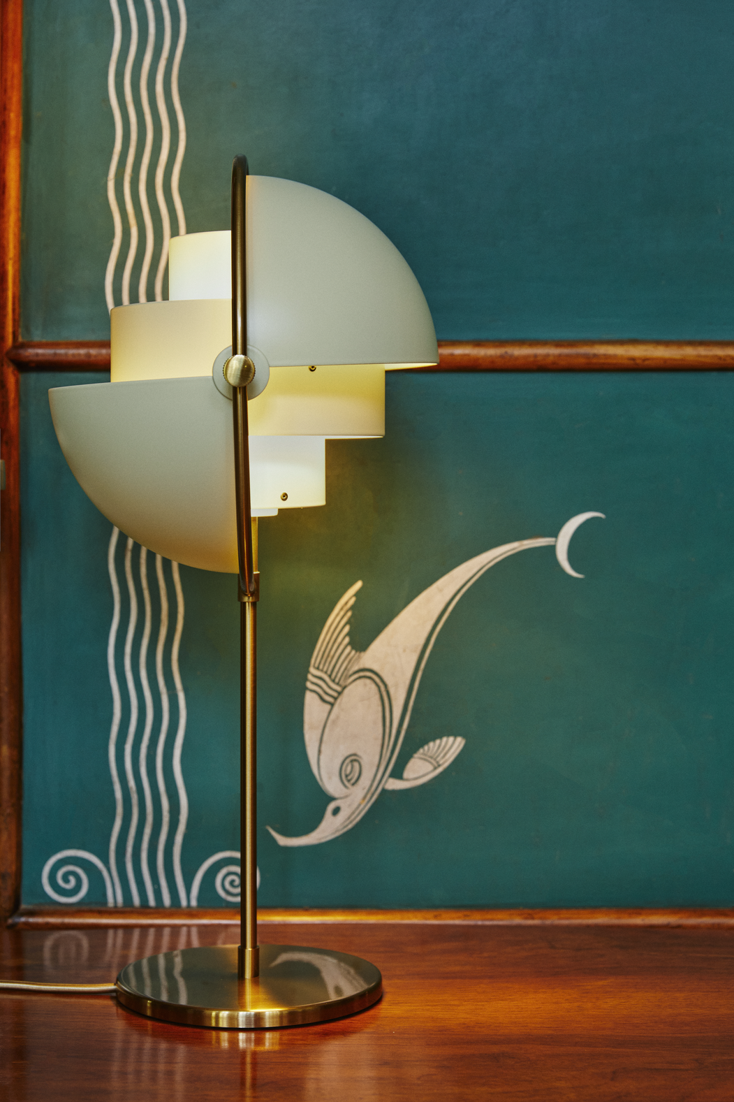 MULTI-LITE table lamp in light green with a brass base