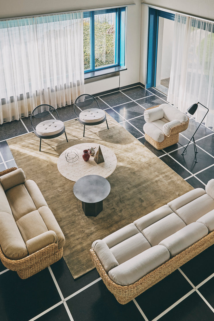 COPACABANA armchair upholstered with an orange base