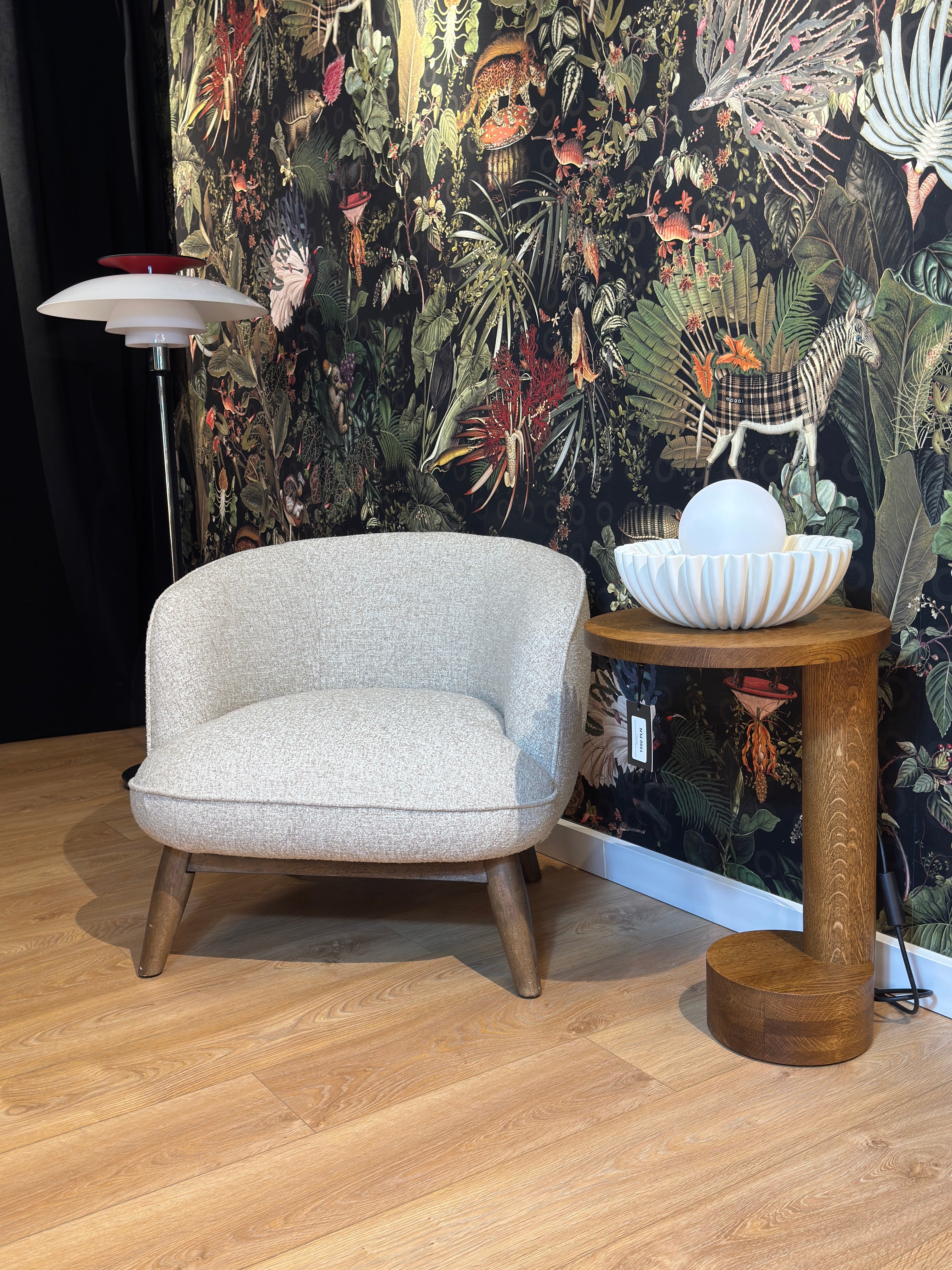 Upholstered armchair BENTON in gray-beige with a wooden base - display model