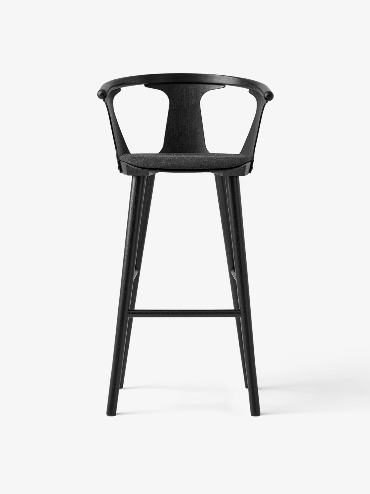 Hocker IN BETWEEN schwarz lackierte Eiche mit gepolstertem Sitz