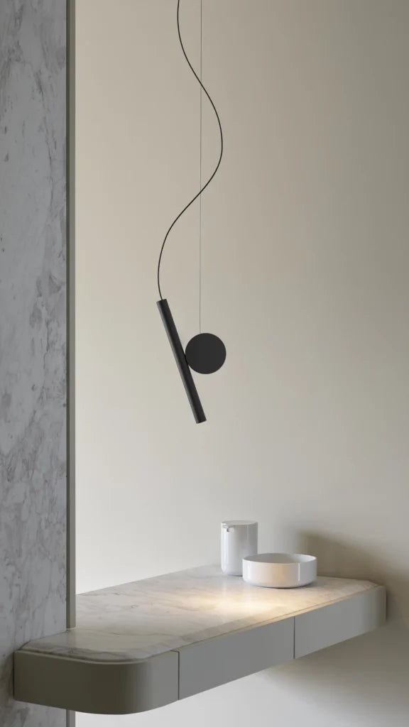 Hanging lamp is brass with black