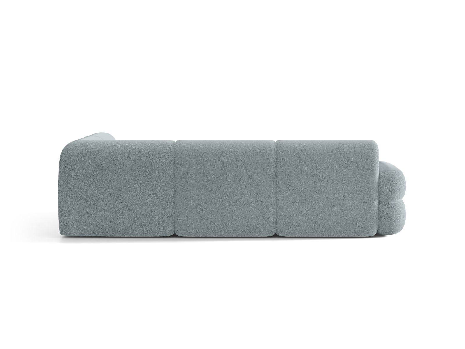 Rechtsseitige L-förmige Eckcouch NEO in himmelblauem Boucle.