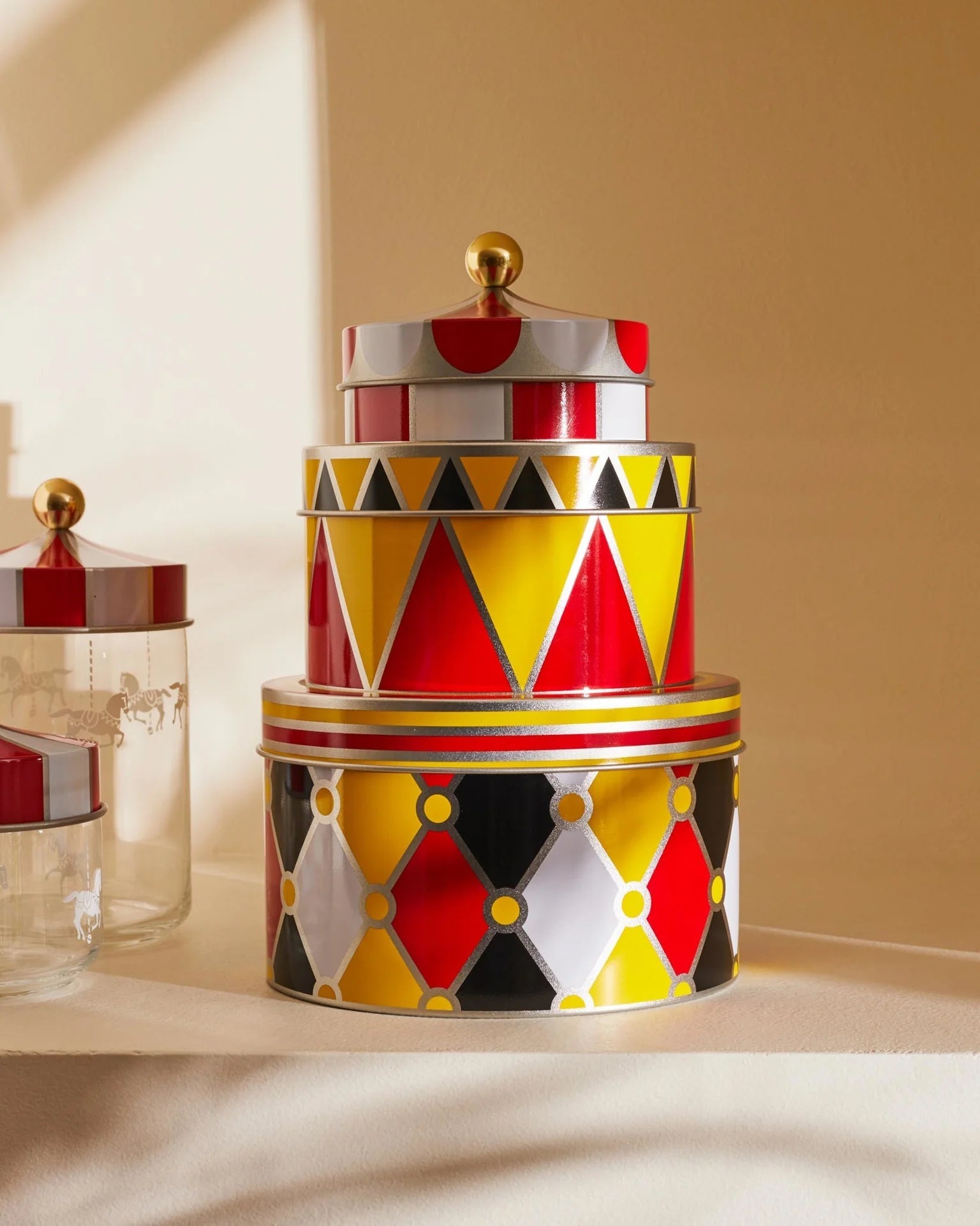 A set of Circus yellow containers with red