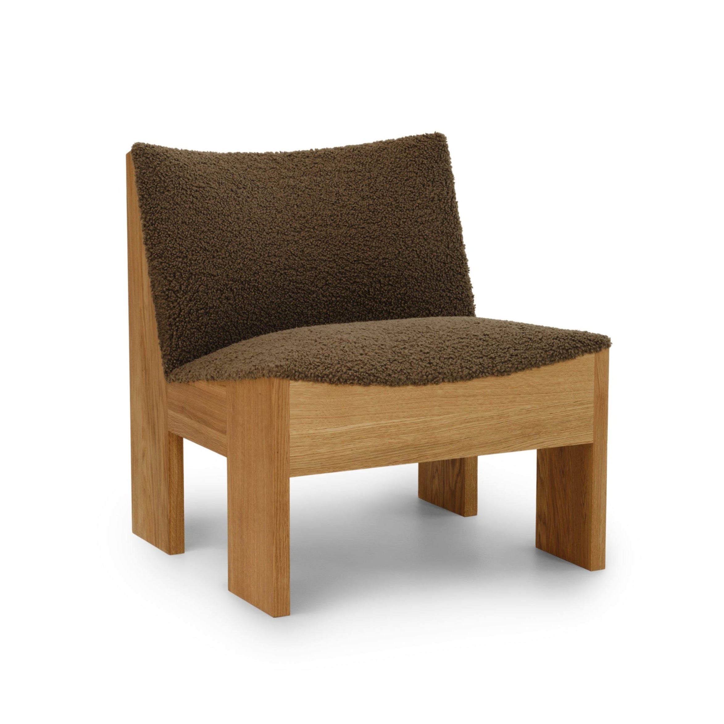 Tenon upholstered armchair with an oak base
