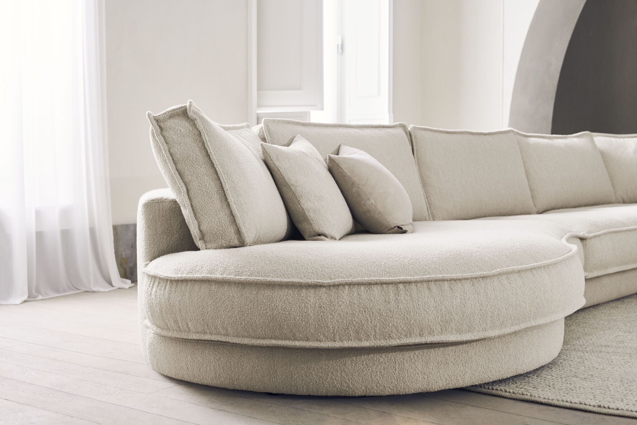 NOORA modular sofa - a rounded right module with an oak base