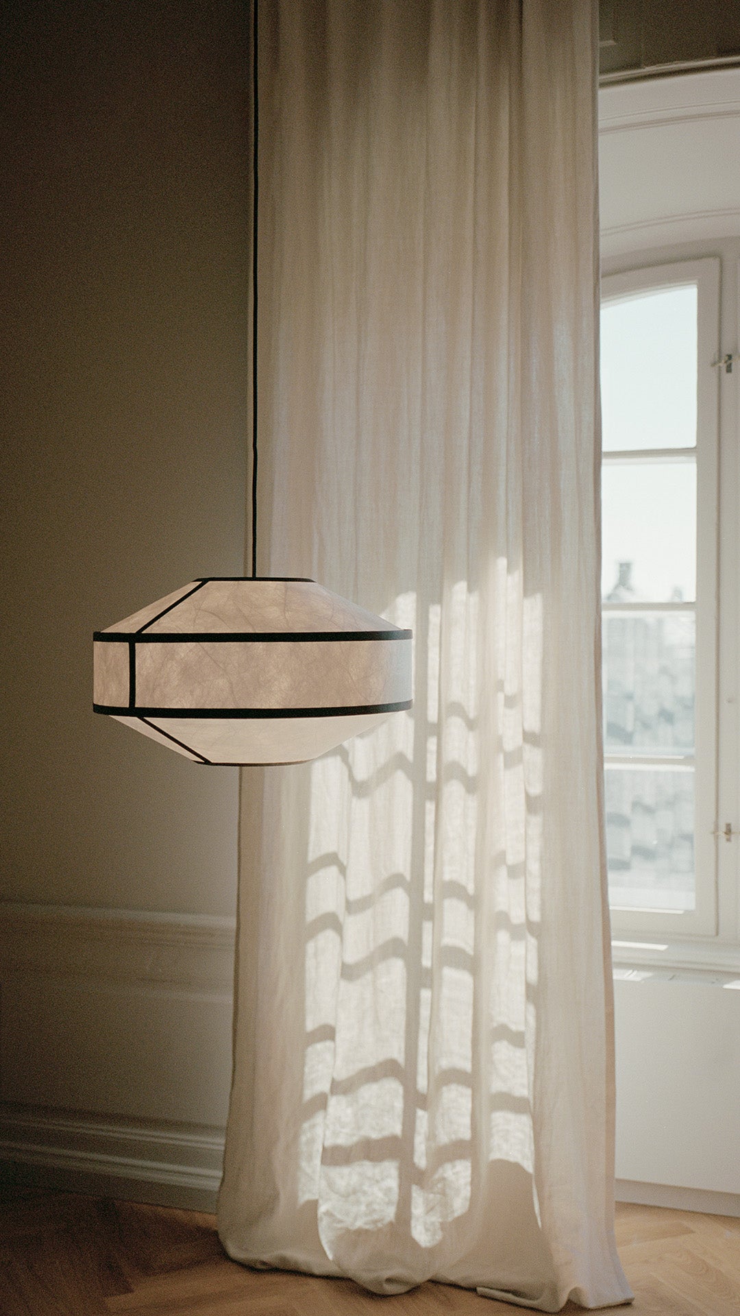 White with black kite hanging lamp with black