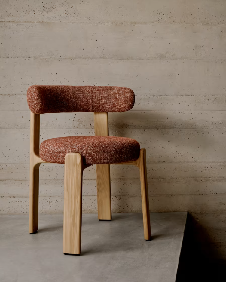 Red granite chair with a wooden base