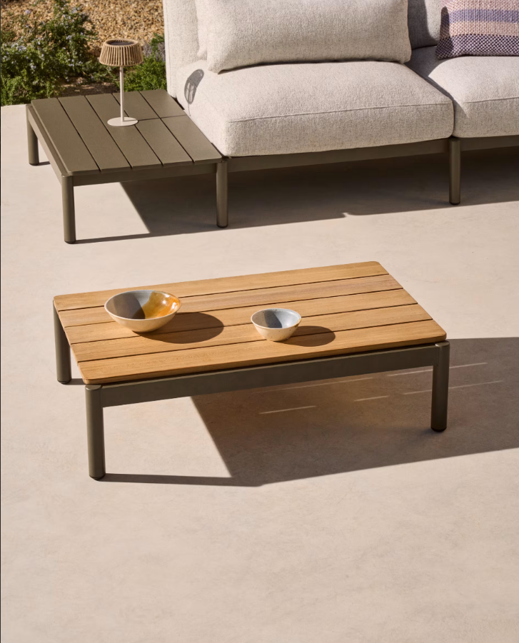 Sorells external coffee table with a dark green base