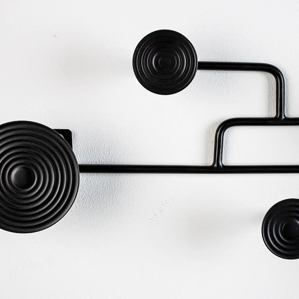HYPNOTISIERENDER Wandhalter schwarz