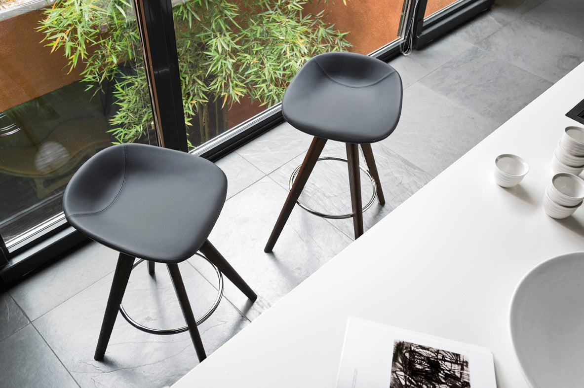 Upholstered BAR STOOL PALM with a dark wooden base