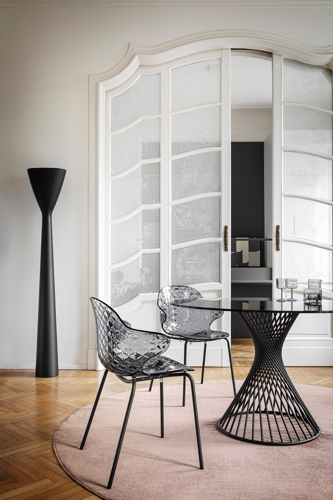 SAINT TROPEZ chair with a transparent seat and a golden metal base