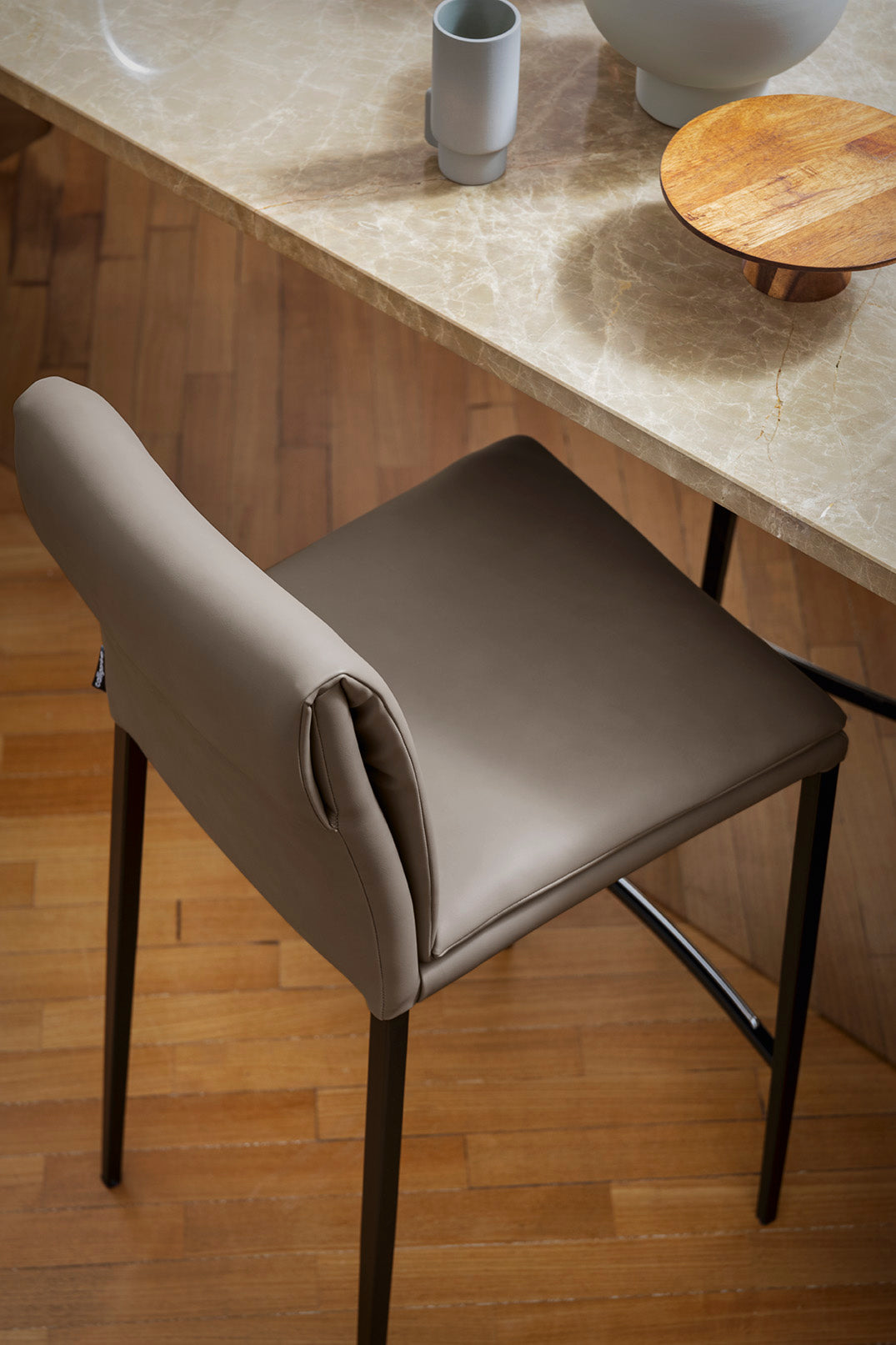 Upholstered bar stool CARMEN with black base