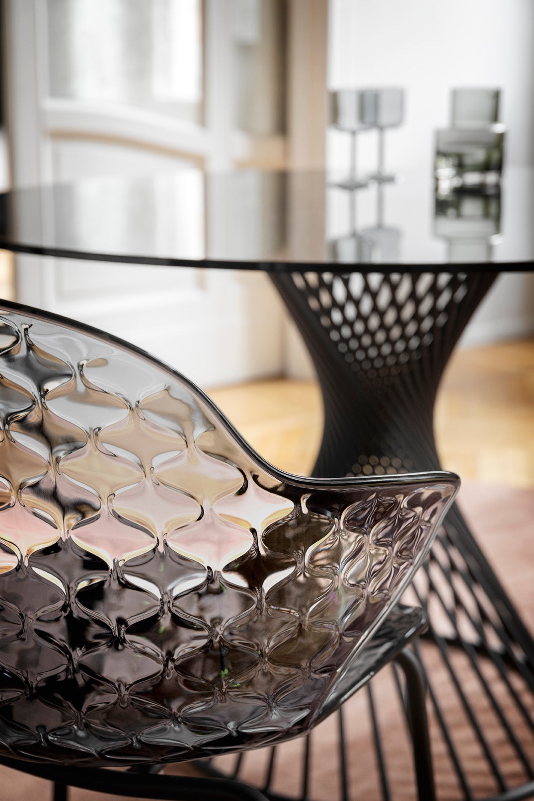 SAINT TROPEZ chair with a transparent seat and a golden metal base