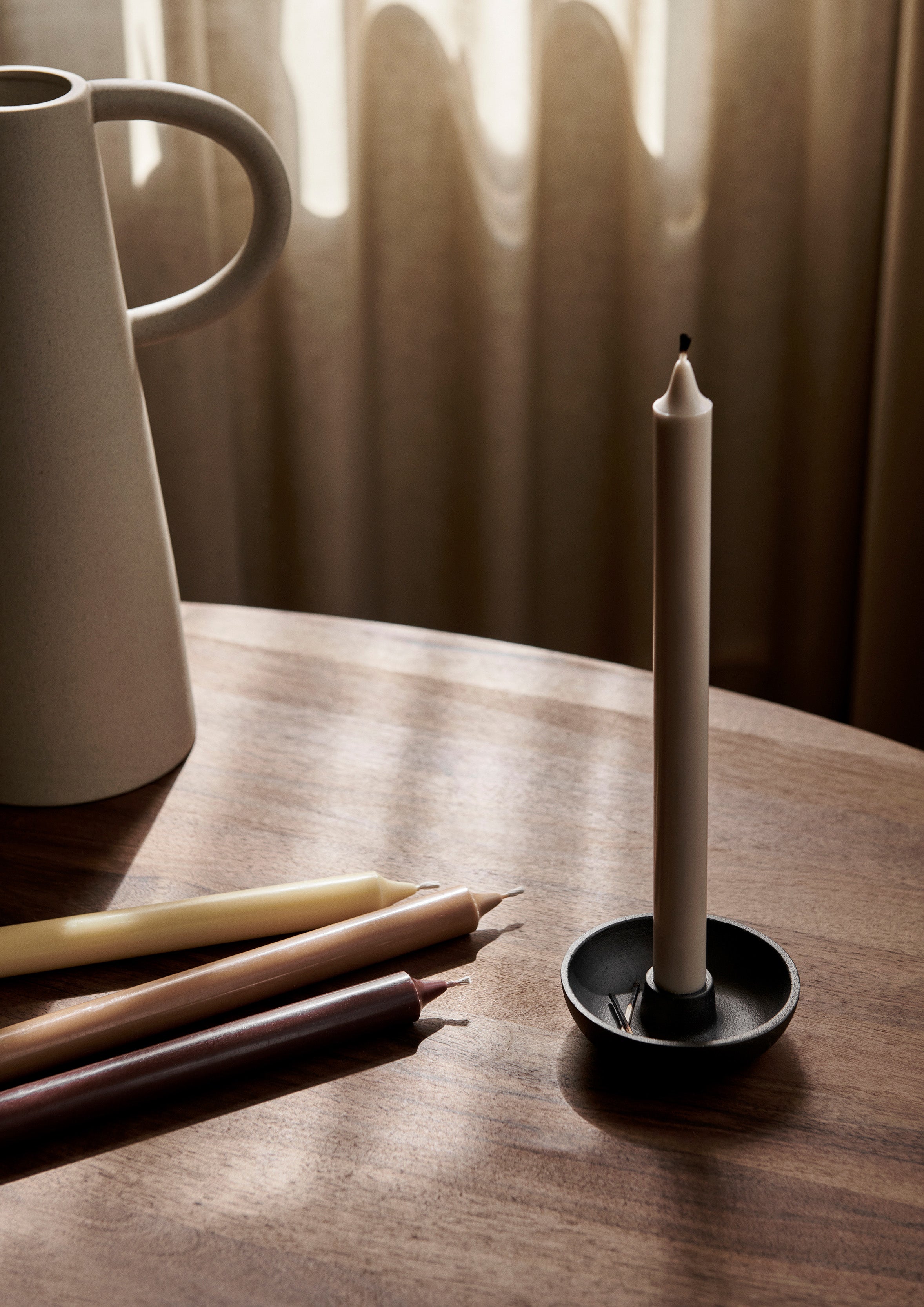 A brown with beige candle candles set