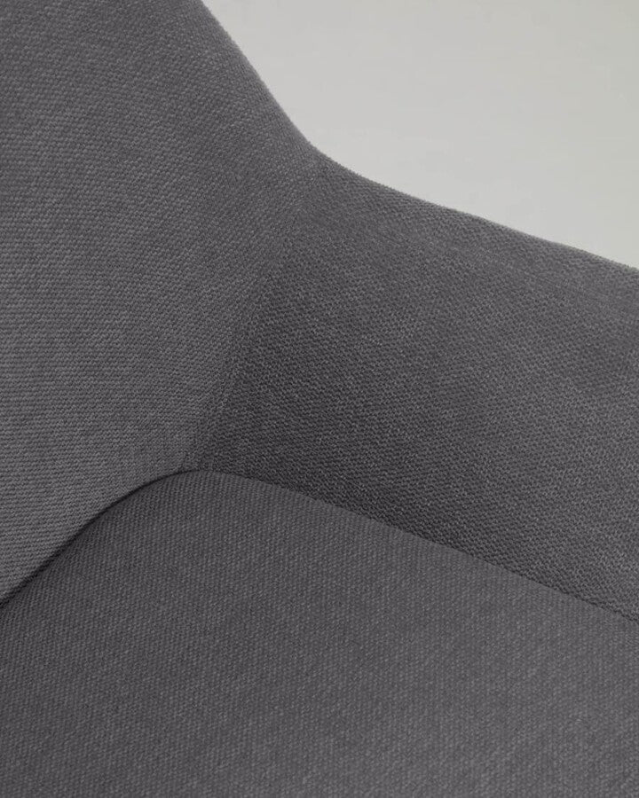 A chair in a dark gray carrier with ash base