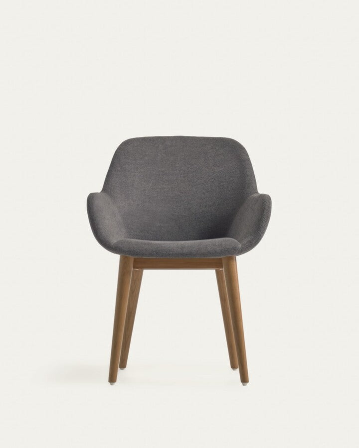 A chair in a dark gray carrier with ash base