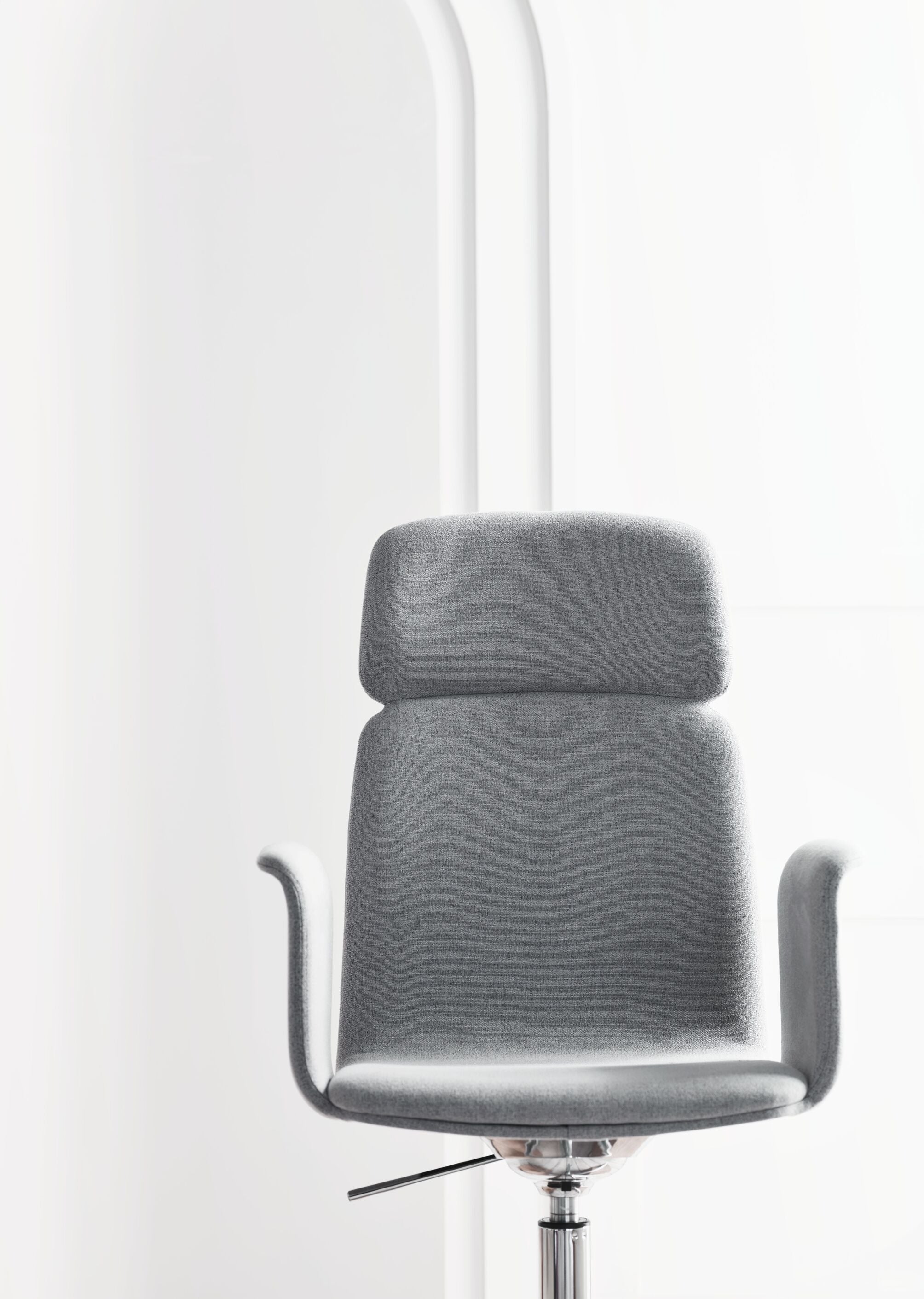 Office armchair with palm armrests upholstered with a metal base