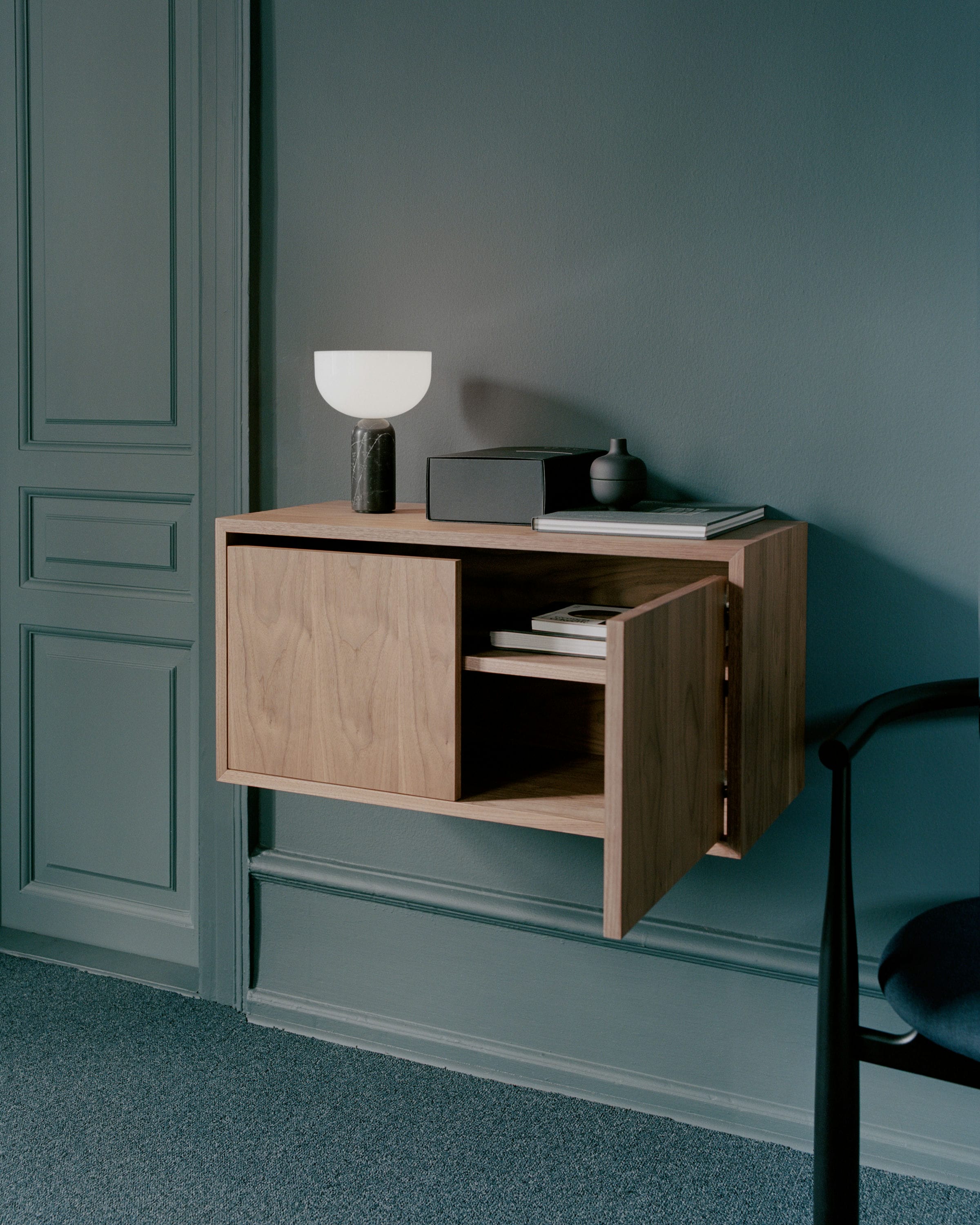 Hanging cabinet with door to New Works Walnut Veneer