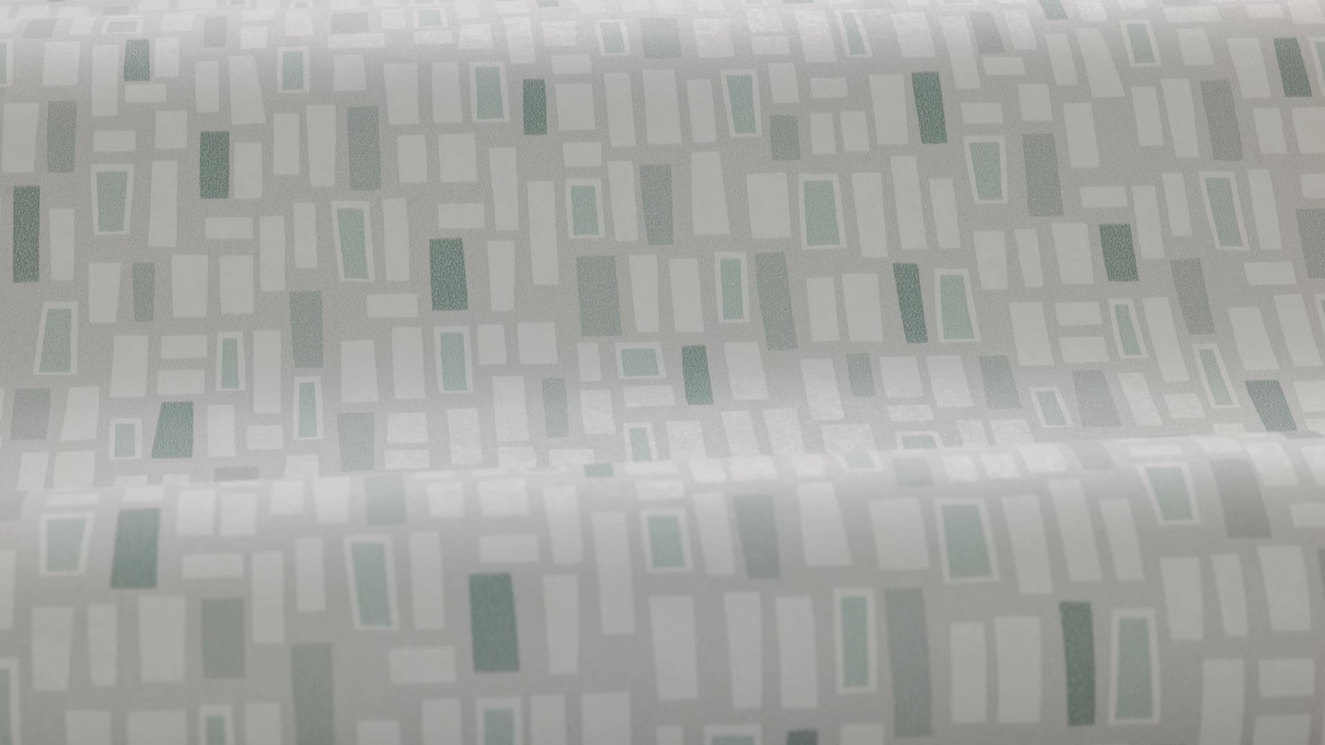 Paper non-woven wallpaper with a green and white geometric pattern ELVIS