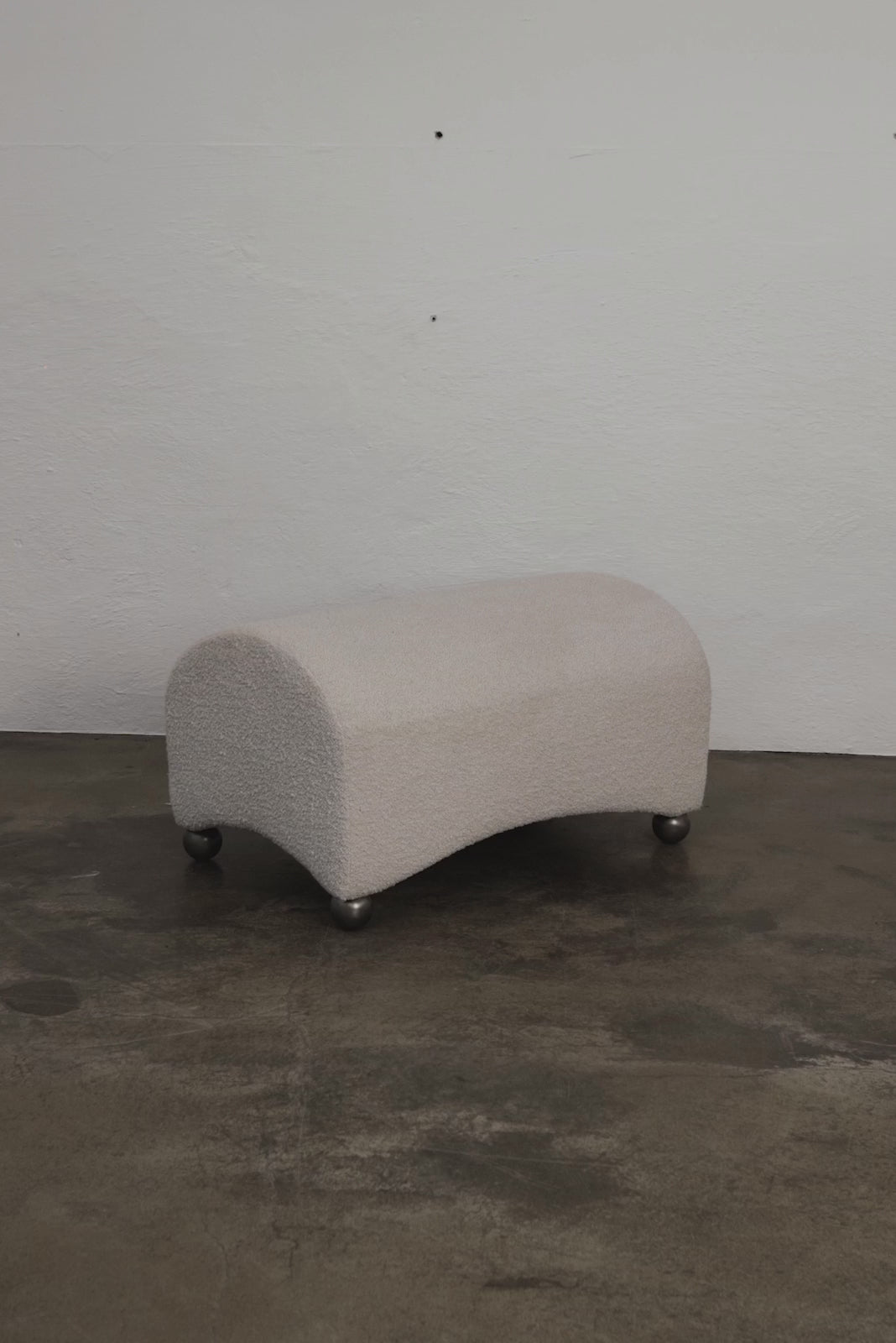 Upholstered ARC Pouf