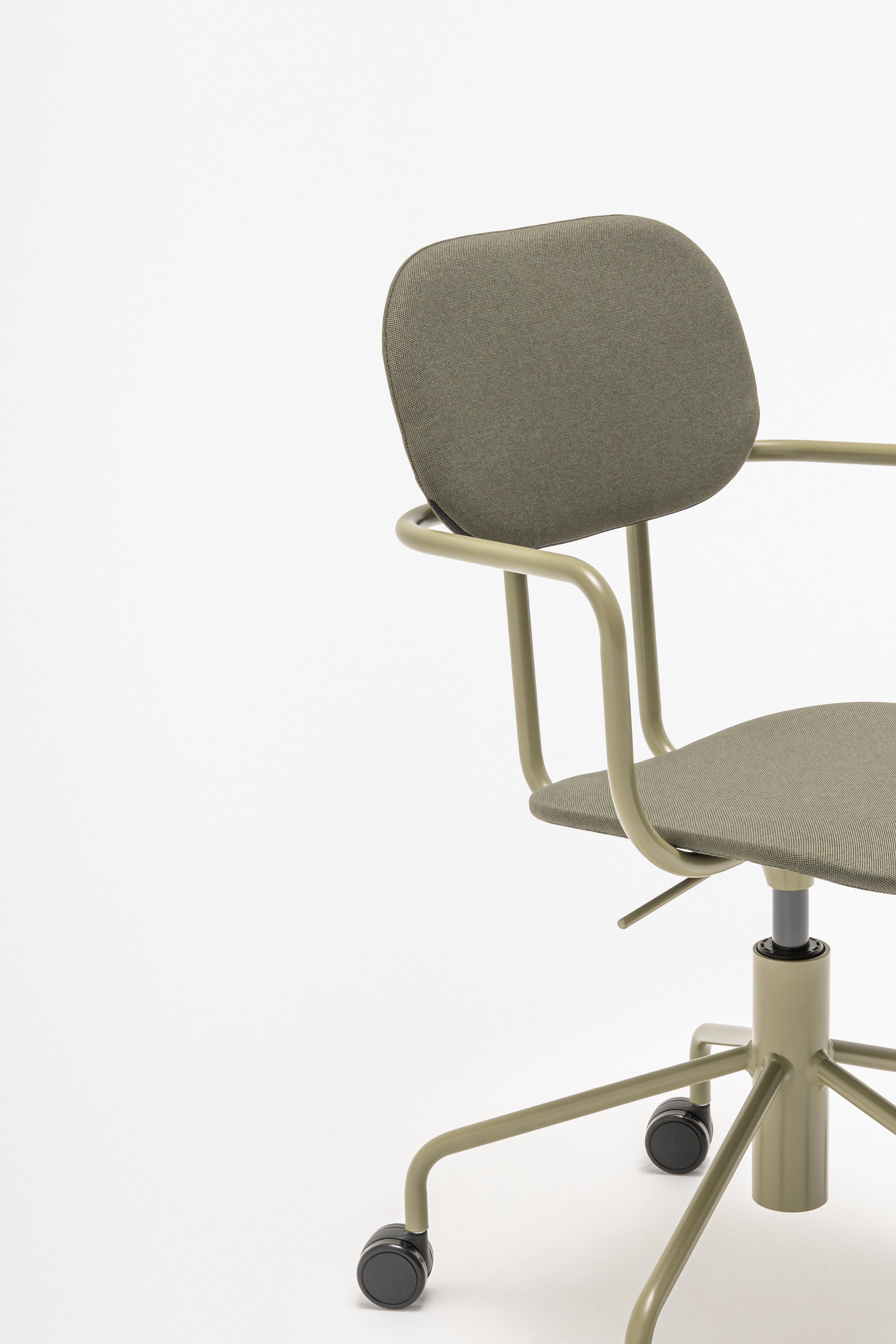 Office chair with adjustable new school base upholstered with wheels to the soft surface