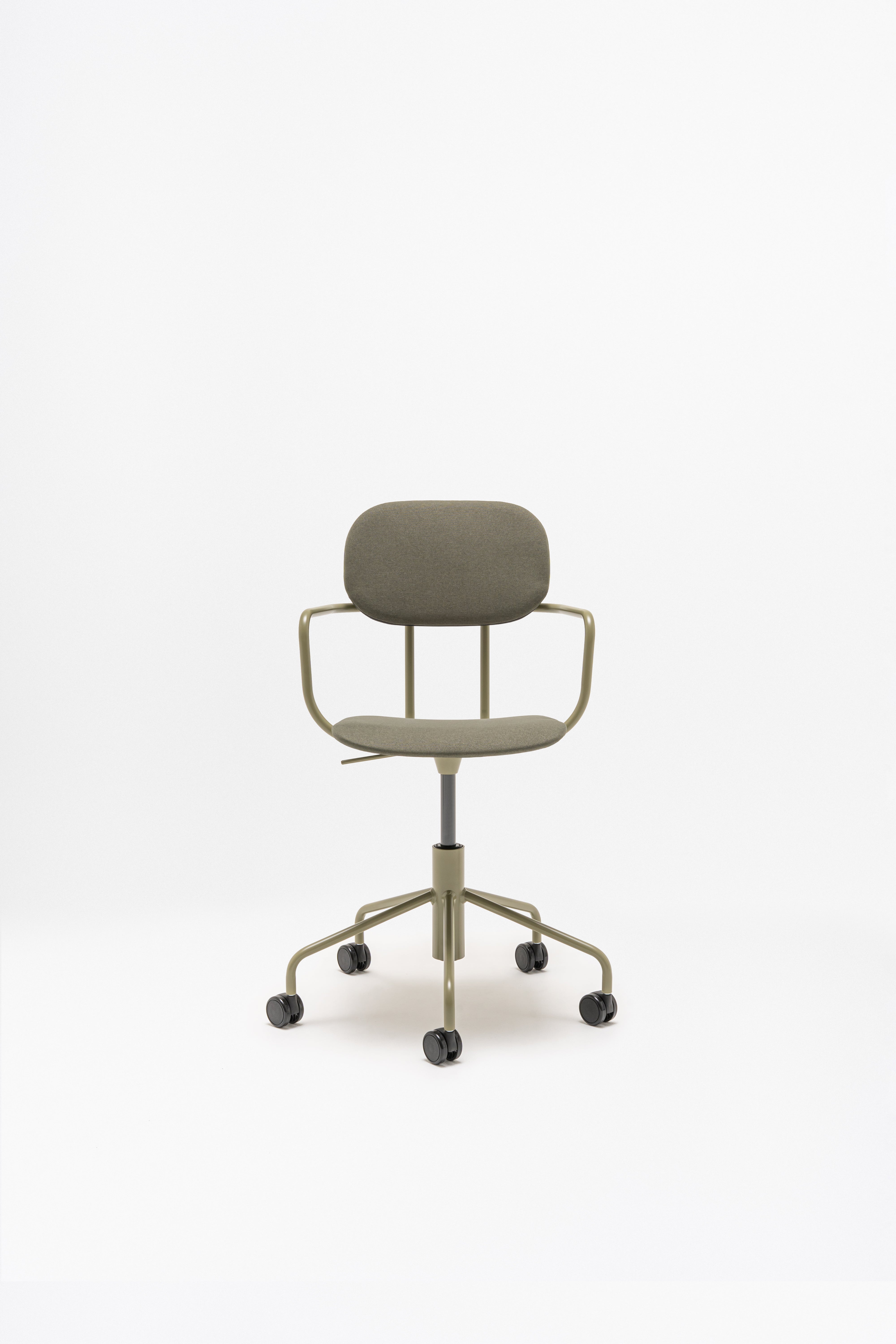 Office chair with adjustable new school base upholstered with wheels to the soft surface