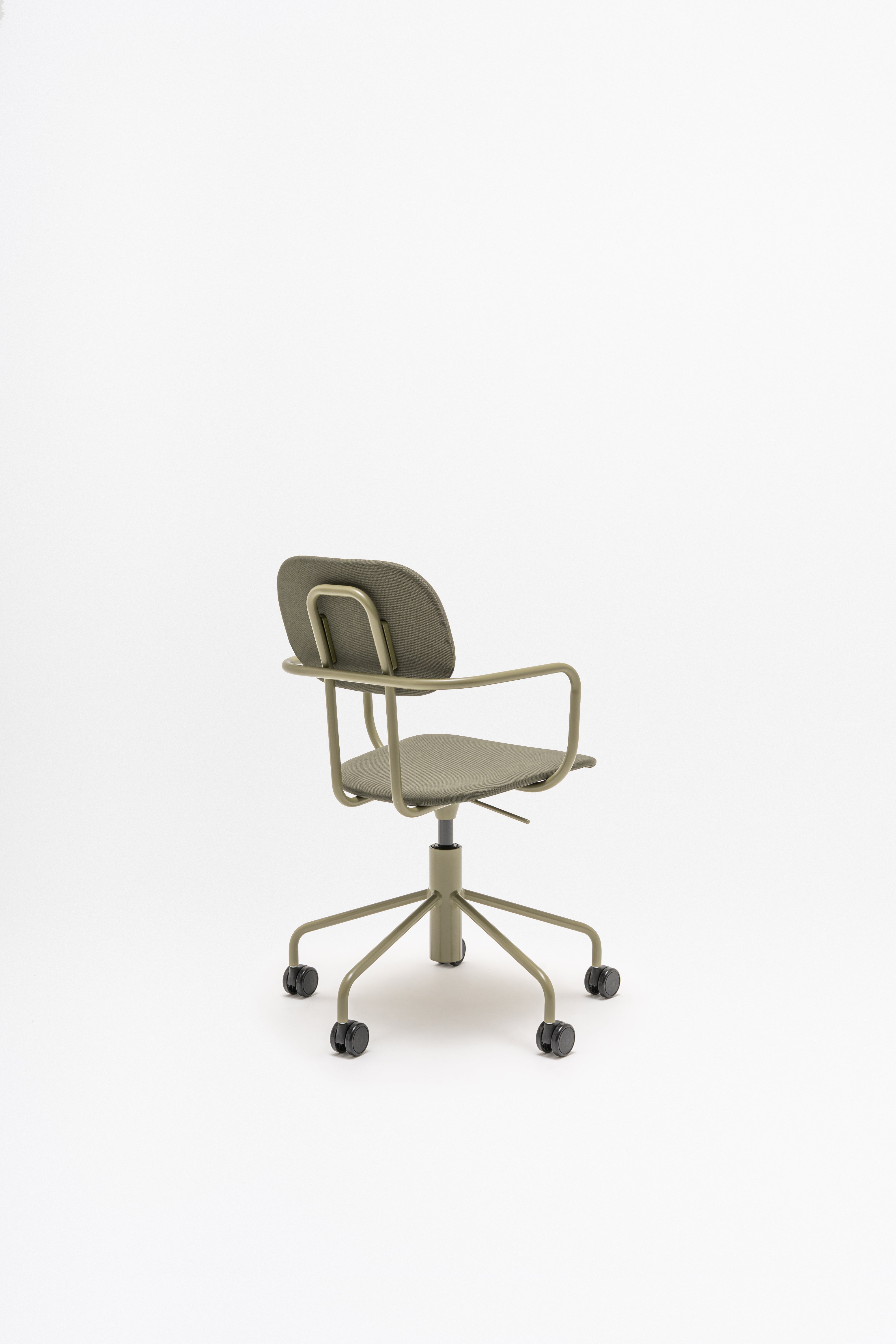 Office chair with adjustable new school base upholstered with wheels to the soft surface