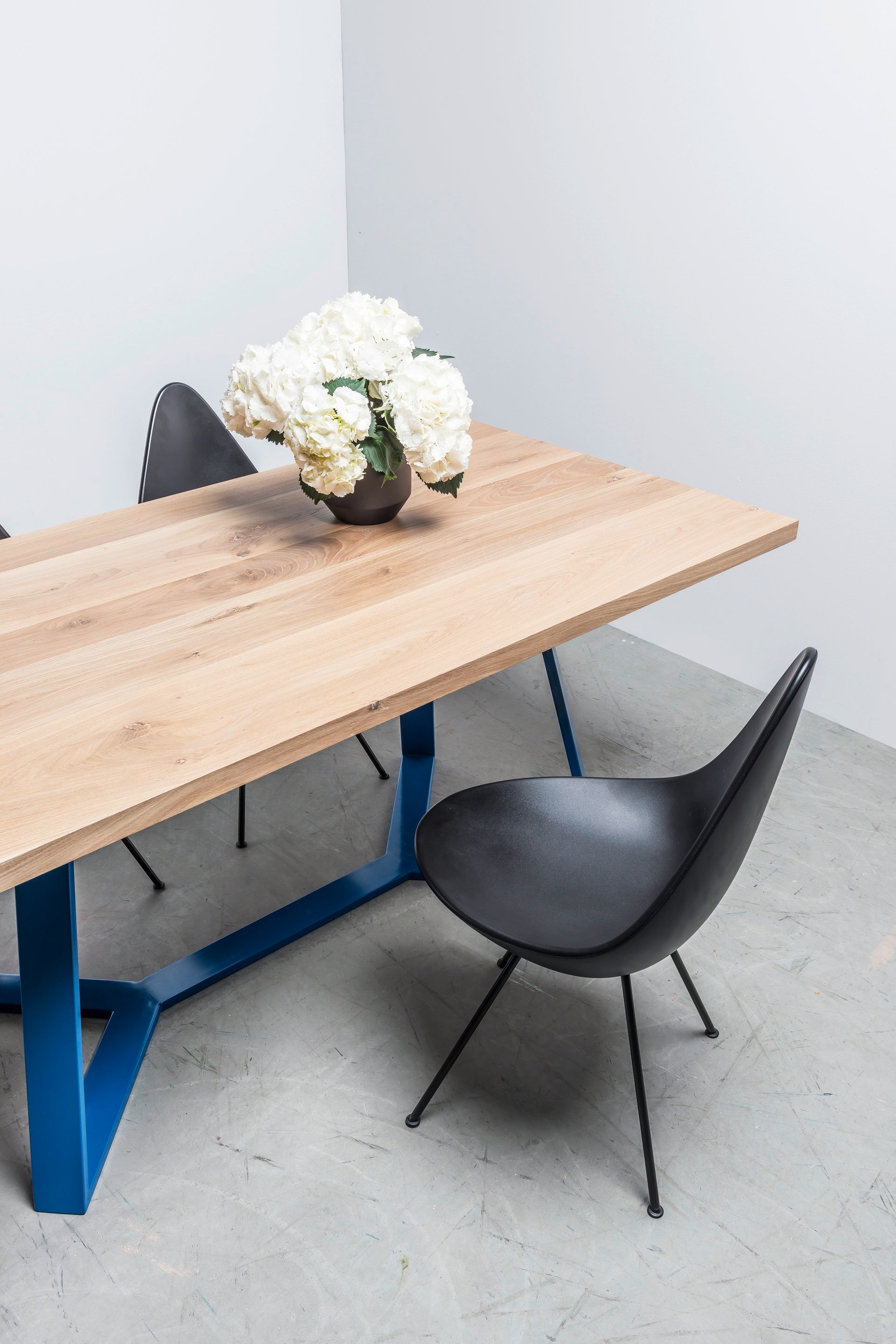 Y oak table top with blue steel base