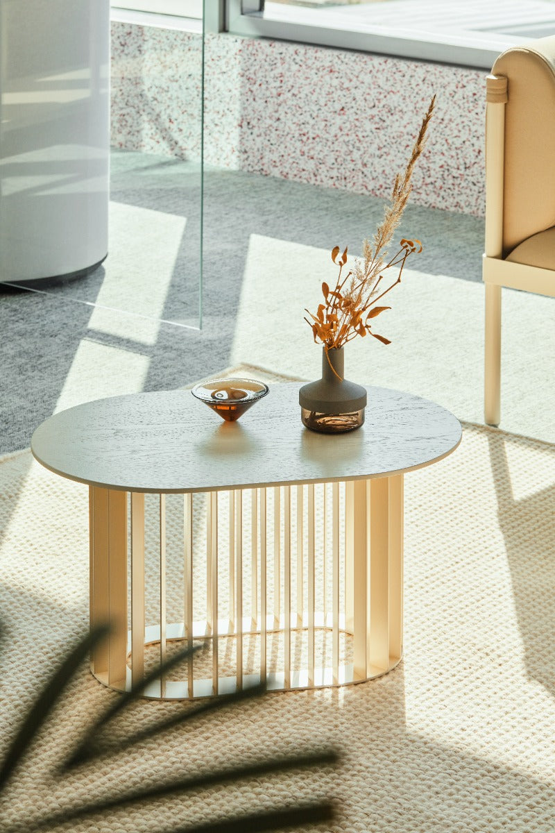 Roll veneer coffee table with a metal base