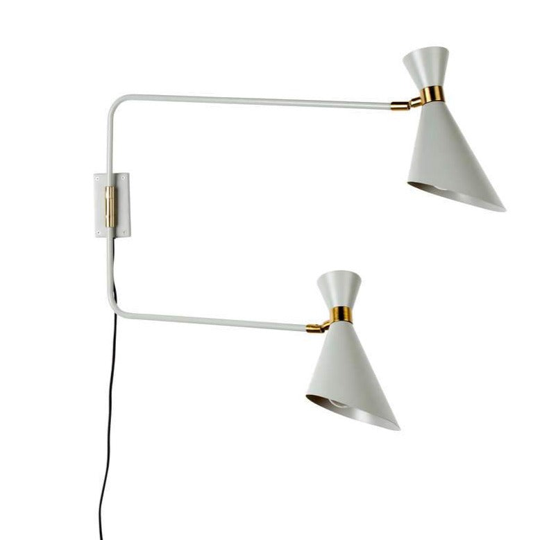Double Shady wall lamp is an amazing combination of two twin shades, which together create something special and give double light. The metal base and brass accessories form a very elegant whole together. A modern living room is calling for hanging this headlight. Any room that needs lighting will definitely like its design, putting everyone in admiration and admiration.