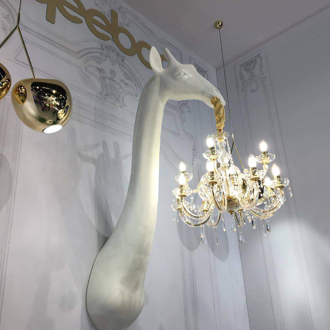 The phenomenal wall lamp, designed by Marcantonio, which will enliven every living room, bedroom or elegant restaurant in an unusual way. The majestic giraffe holds a chandelier in the style of Maria Teresa in a miniature version. This is the perfect combination of good design with functionality.