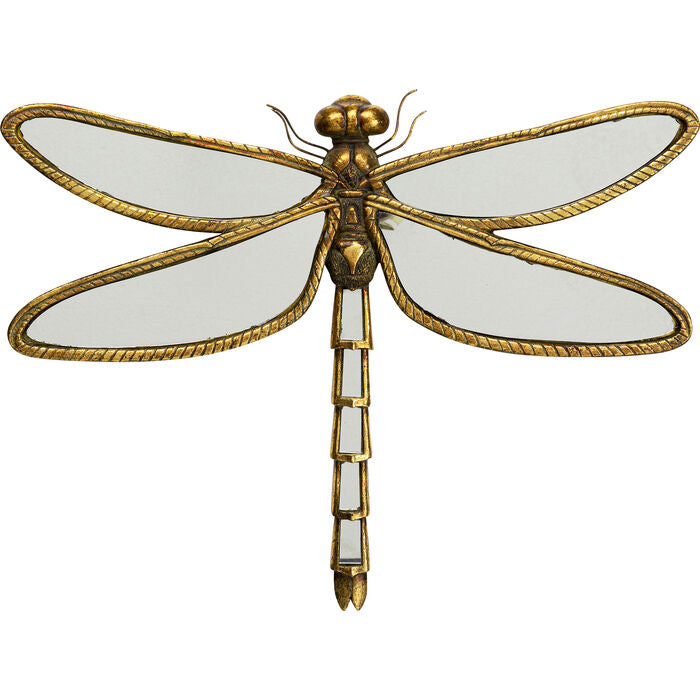 The dragonfly -shaped mirror looks surprising, unusual and expresses the unique sense of the modern style. Hanged independently draws the attention of every guest visiting the household, several such mirrors create an extremely effective wall decoration. Hanging a few next to each other will brighten each room. The golden color fits each wall color from toned in the dining room to the dark color of the hall. It can complement the minimalist offices.