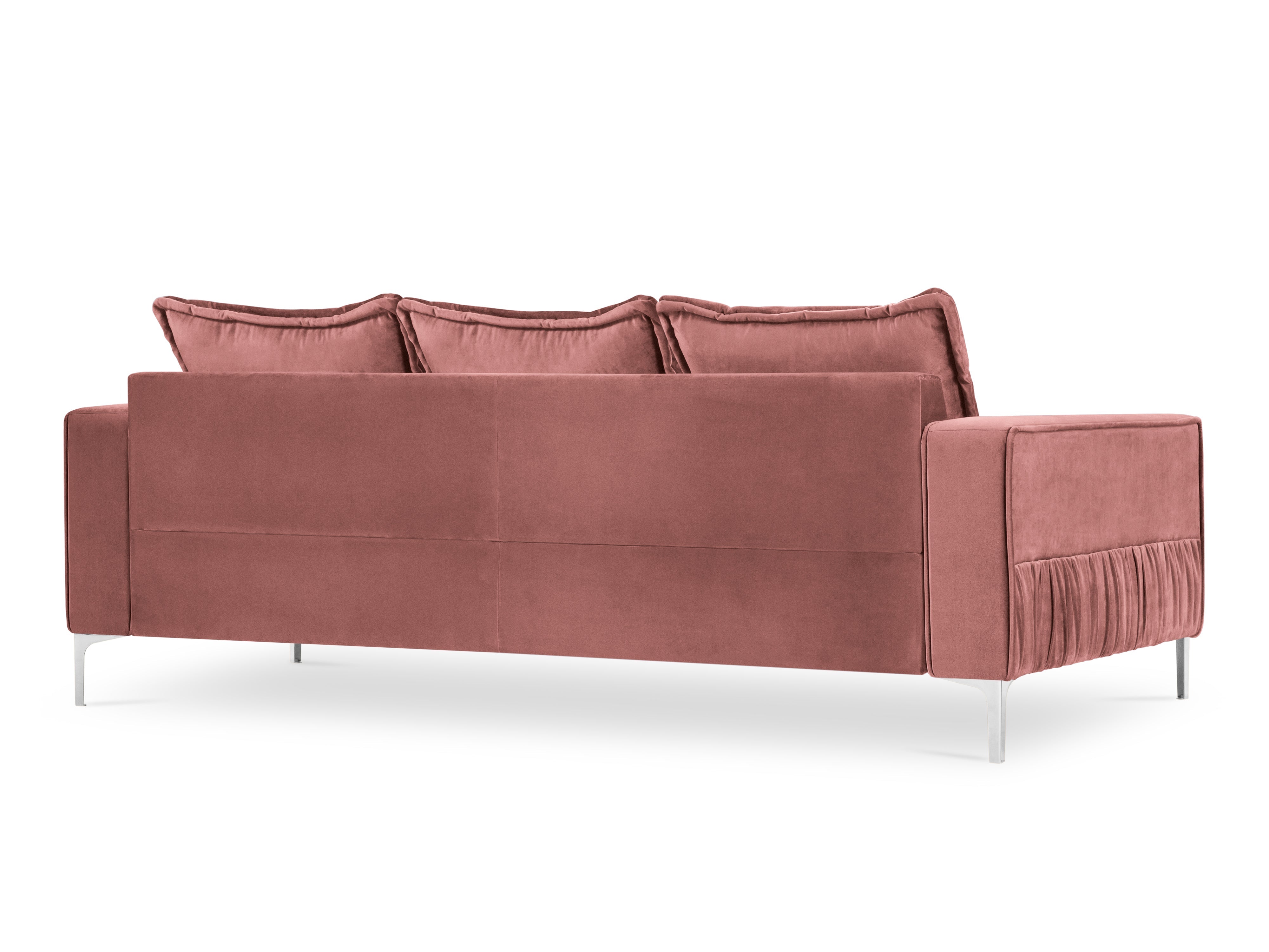 Pink velvet sofa with pillows