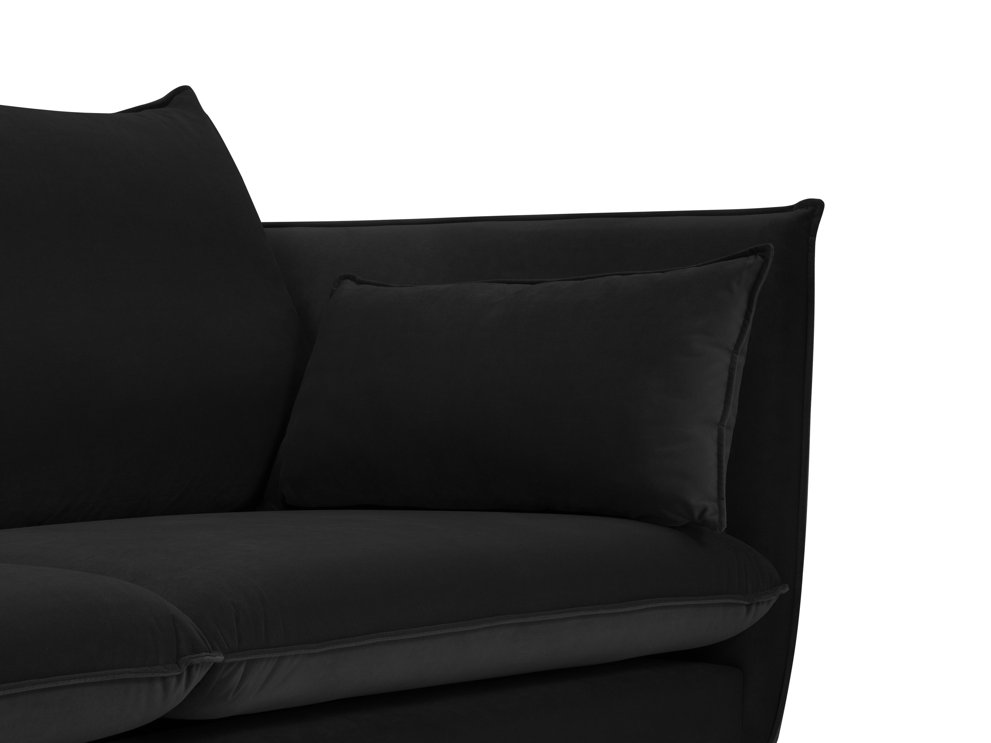 velvet sofa with pillows